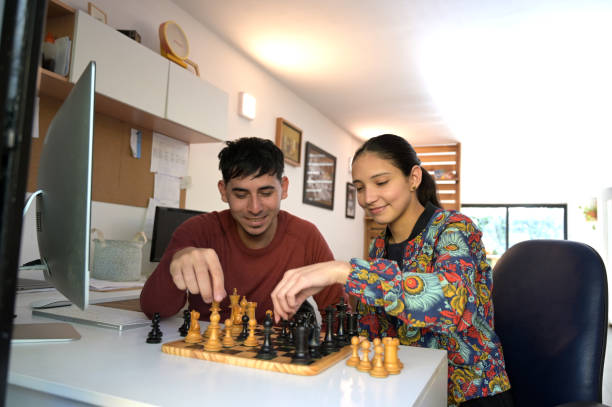 istock playing board games after work in the office 2154330660