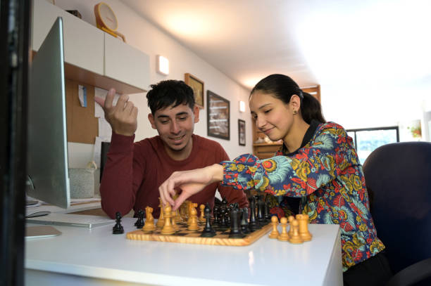 istock playing board games after work in the office 2154330753