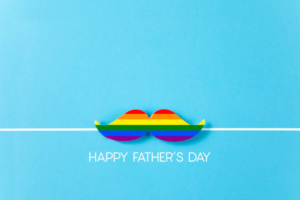 Happy Father's Day message with rainbow colored paper mustache on blue background