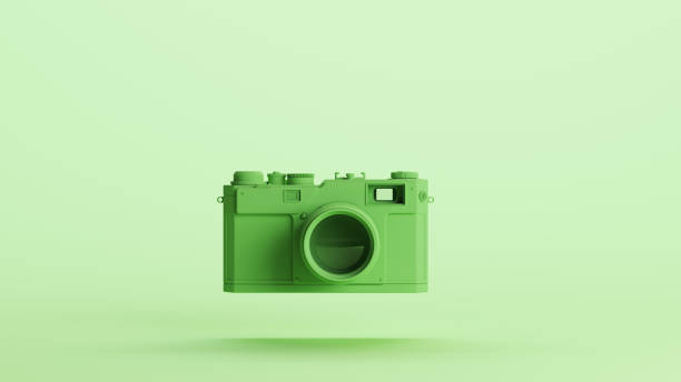 istock Green camera lens retro style nostalgia soft tones mint background 2154333512