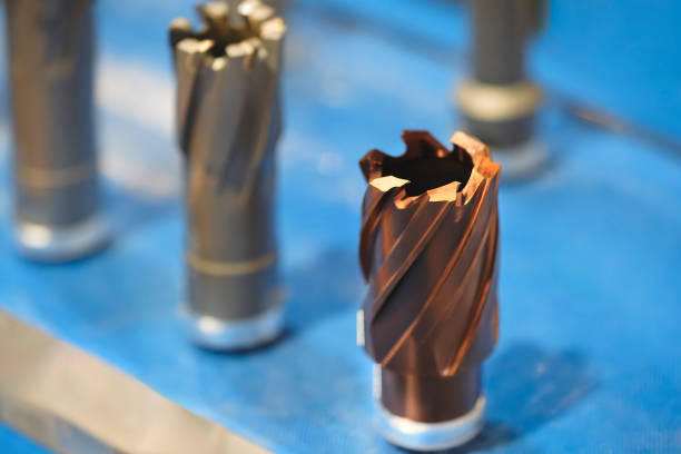 industrial drilling milling metal cutting tool with carbide cutter insert in workshop. Drills with interchangeable tungsten carbide heads. Milling metal cutter tools CNC machine, industrial background