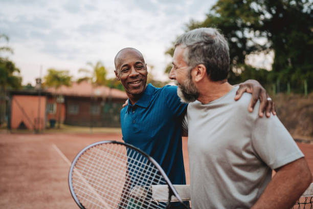 istock Two friends tennis game final 2154343123