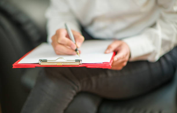 istock Businesswoman working at her desk in an office environment 2154343176