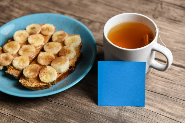 Blue Note Telling The Type Of Tea Served With Banana, Bread And Peanut Butter Lunch