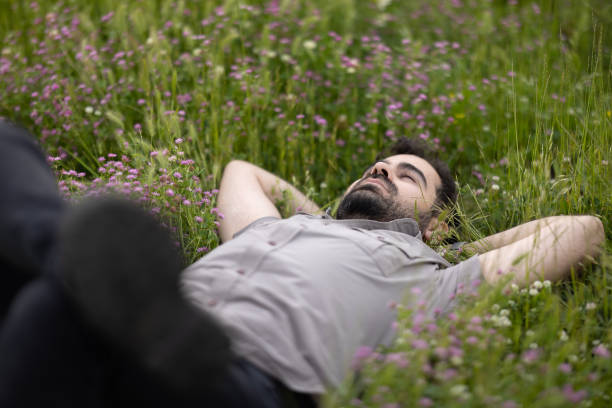 istock Relaxed man spending time outdoors. 2154345588