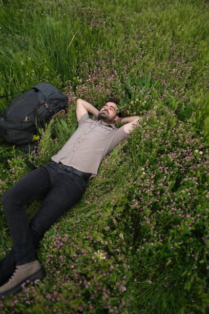istock Travel blogger man with backpack hike 2154346333