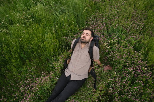 istock Relaxed man spending time outdoors. 2154347437