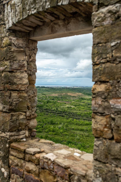 Valley view through the ruined medieval window