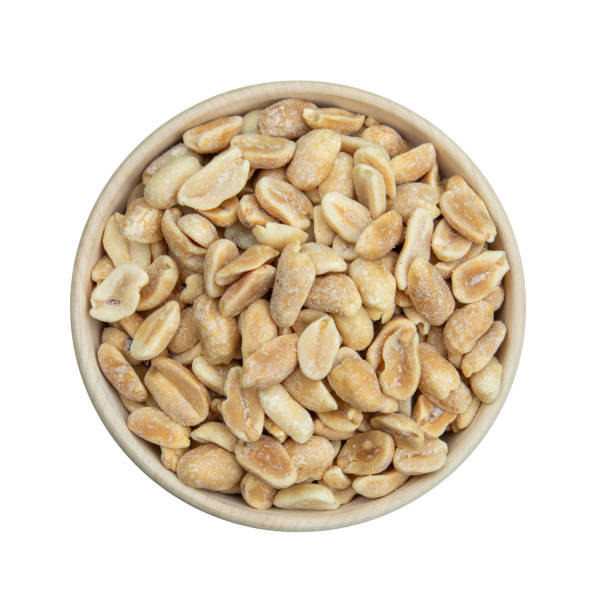 istock bowl of peanuts on white 2154357550