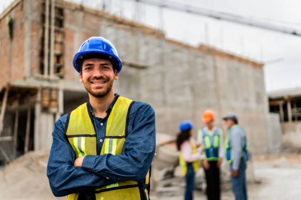 istock Portrait of young builder man on construction site 2154368095