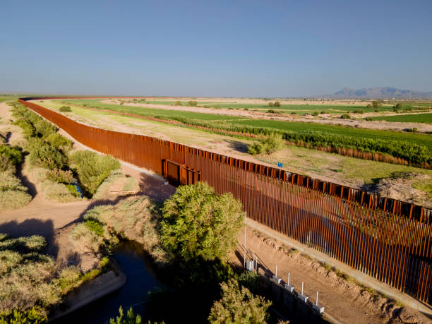 istock Drone View International Border Wall at Tornillo Crossing in Texas At Dusk 2154373457
