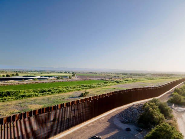 istock Drone View International Border Wall at Tornillo Crossing in Texas At Dusk 2154373604