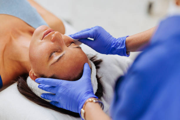Skin examination by a female dermatologist
