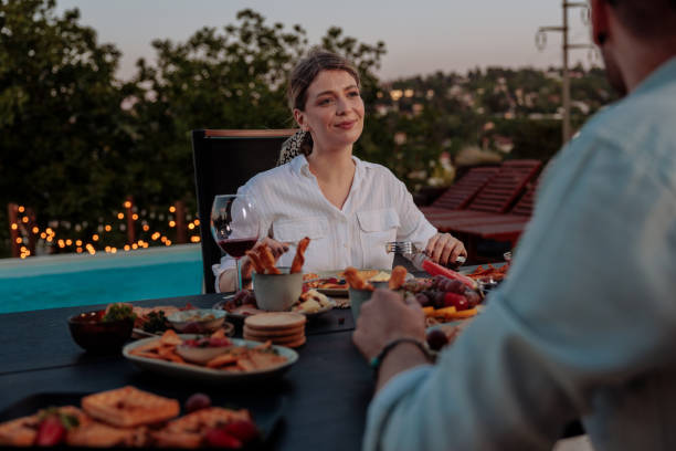 istock Couple having a romantic dinner in their backyard 2154373823