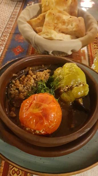 Dolma made with tomatoes and sweet pepper.