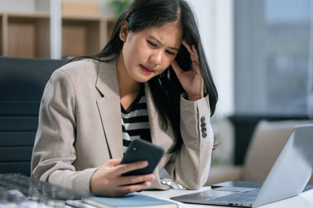 istock Businesswoman talking on the phone arguing laptop computer problems highlighting customer dissatisfaction. 2154382039