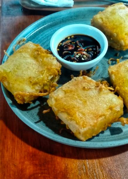 istock Fried tofu with spices on the side 2154390226