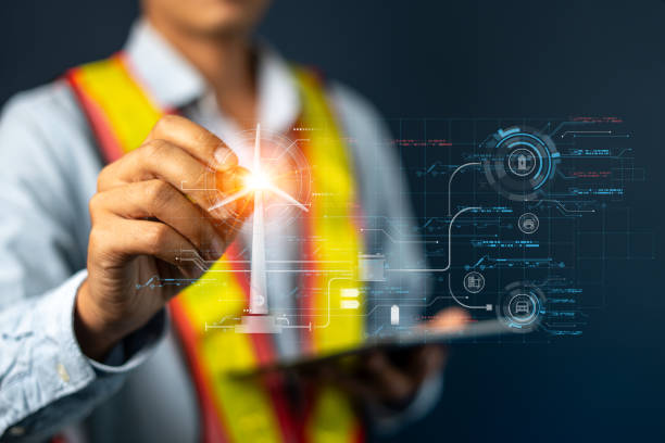 istock Engineers use AI artificial intelligence to inspect wind turbines and analyze the data of the electricity generated using hologram HUD. Clean energy technology and renewable energy. 2154390593