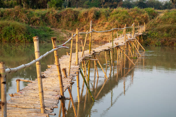 The bamboo foot bridge for crossing the river