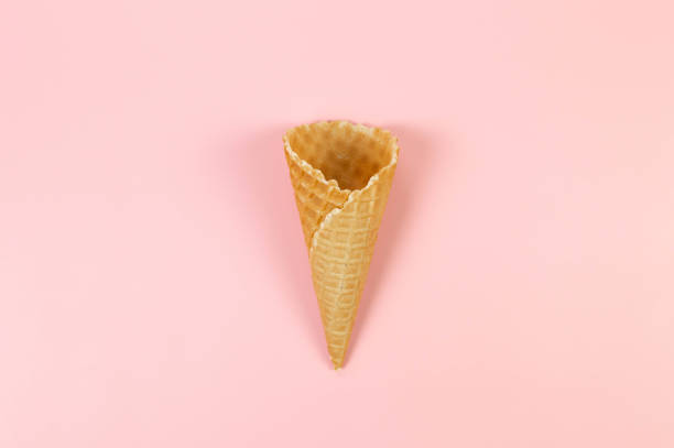 istock Top view of ice cream waffle cone on pink background. 2154402621