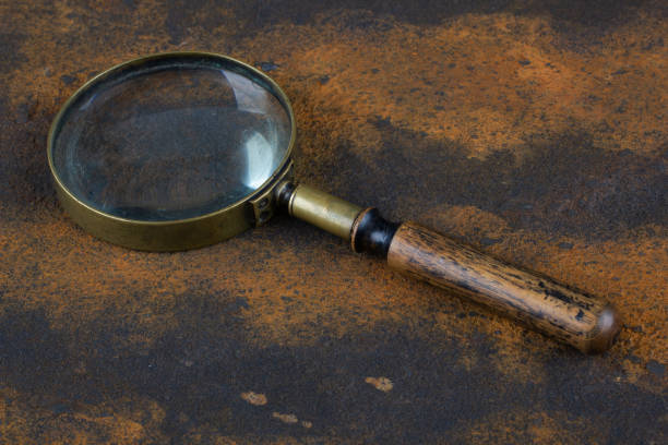 istock Vintage magnifying glass on metal rusty background, 2154405107