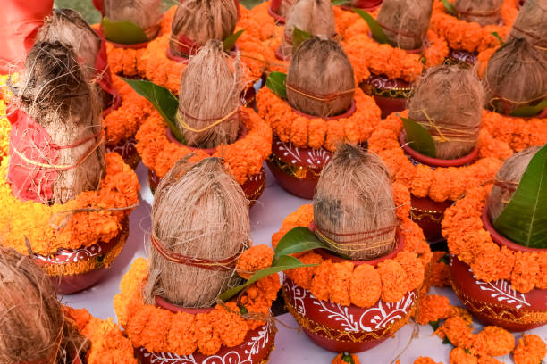 istock Kalash with coconut and mango leaf with floral decoration earthen pots containing sacred water. Kalash for hindu puja during Jagannath Temple Mangal Kalash Yatra, front view, closeup 2154405374