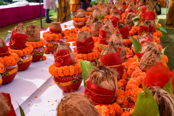 istock Kalash with coconut and mango leaf with floral decoration earthen pots containing sacred water. Kalash for hindu puja during Jagannath Temple Mangal Kalash Yatra, front view, closeup 2154405566