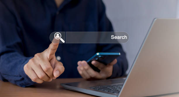 istock Searching the internet with a search bar working on a smartphone, internet network concept. 2154407549