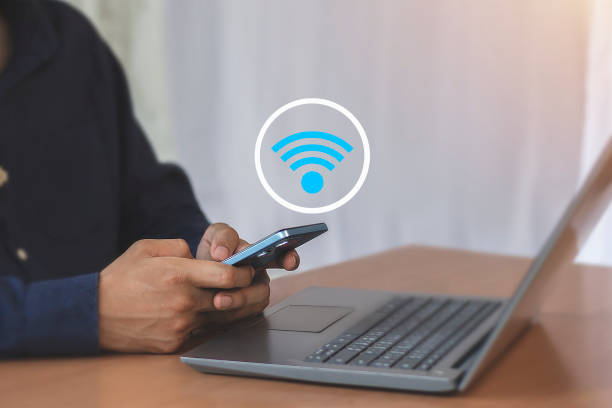 istock Use business smartphone with wifi icon, business communication social network concept. 2154407552