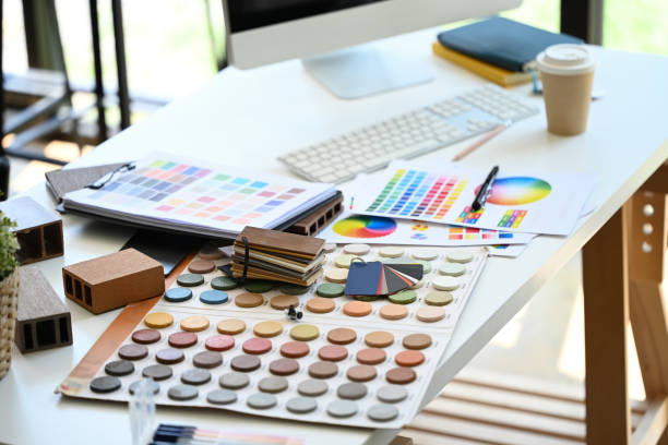 istock Interior designer working table with material sample and color swatches 2154412344