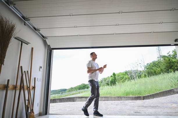 repair person working in garage.