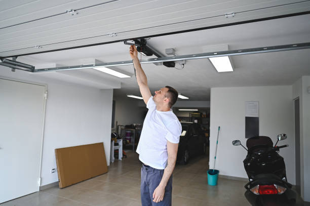 istock Mid adult working in a car garage. 2154413141