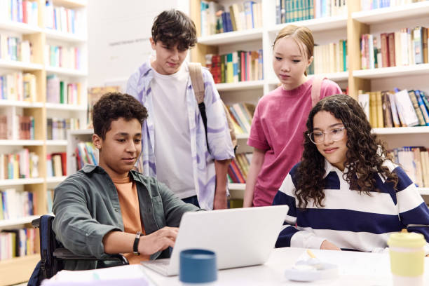 istock Diverse Group of Students in Library at School 2154414845