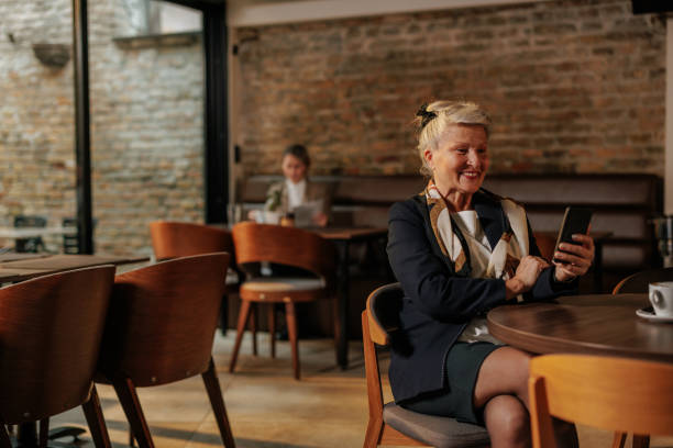 istock Elegant businesswoman using a cellphone on a lunch break. 2154415029
