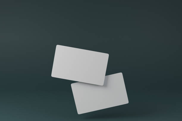 istock White blank business cards mock up on dark green background. 2154420575