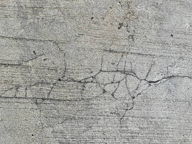 istock a photography of a concrete surface with cracks and cracks. 2154423132