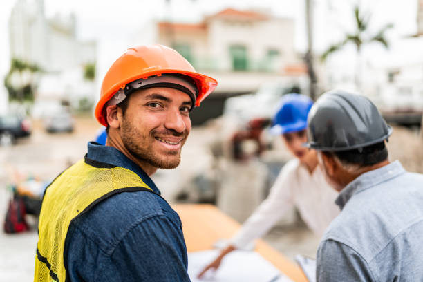 istock Portrait of young architect man on a meeting at construction site 2154424585