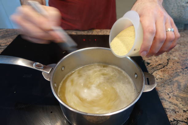 Garlic and semolina soup being prepared by a chef