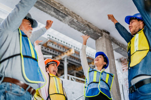 istock Coworkers celebrating on construction site 2154426983