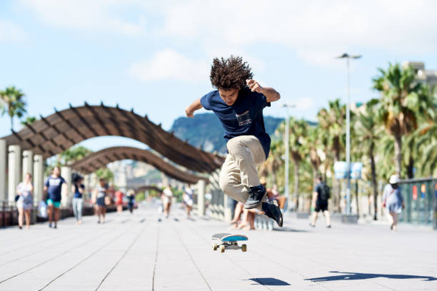 istock Boy performing heel flip on skateboard. 2154430069