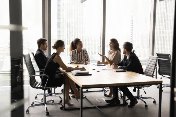 istock Diverse business partners meeting on serious conversation 2154432133