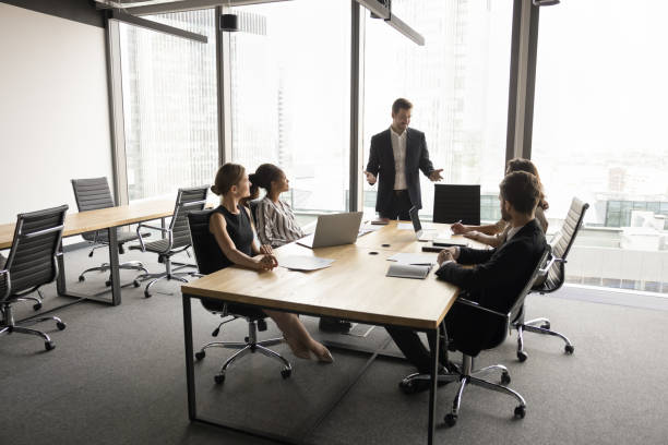 istock Diverse business team meeting in modern urban office interior 2154432310
