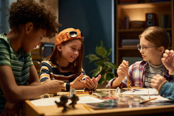 istock Group of kids choosing character roles 2154432728