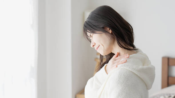 istock A woman caring about her aching shoulder 2154433253