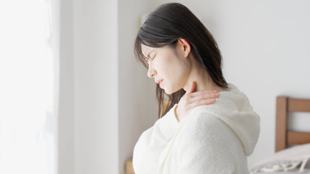 istock A woman caring about her aching shoulder 2154433268