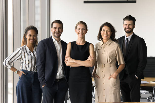 istock Successful diverse younger and elder business professionals standing in row 2154434496