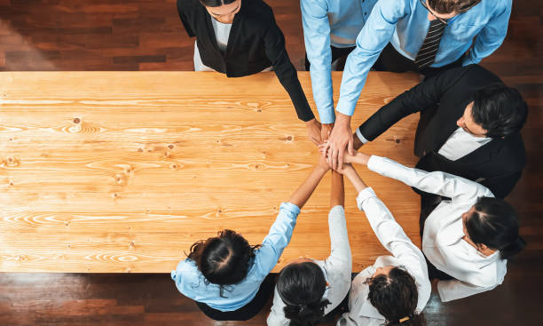 istock Multiracial business people make synergy hand stack together. Habiliment 2154434620