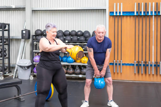 istock Seniors Working Out With Kettlebells 2154436520