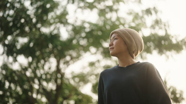 istock Teenager patient exercise walking at park. 2154437484