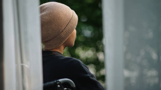 istock Patient sitting on wheelchair. 2154437520